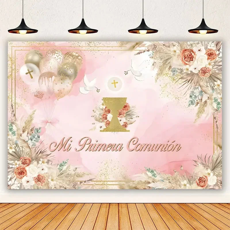 A pink first communion photography backdrop featuring gold accents, floral elements, and white doves.