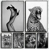 A collage of black and white photographs featuring high heels, a leopard, and people.
