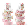 A set of twelve rolls of retro floral washi tape in various pink and green patterns for crafting and journaling.
