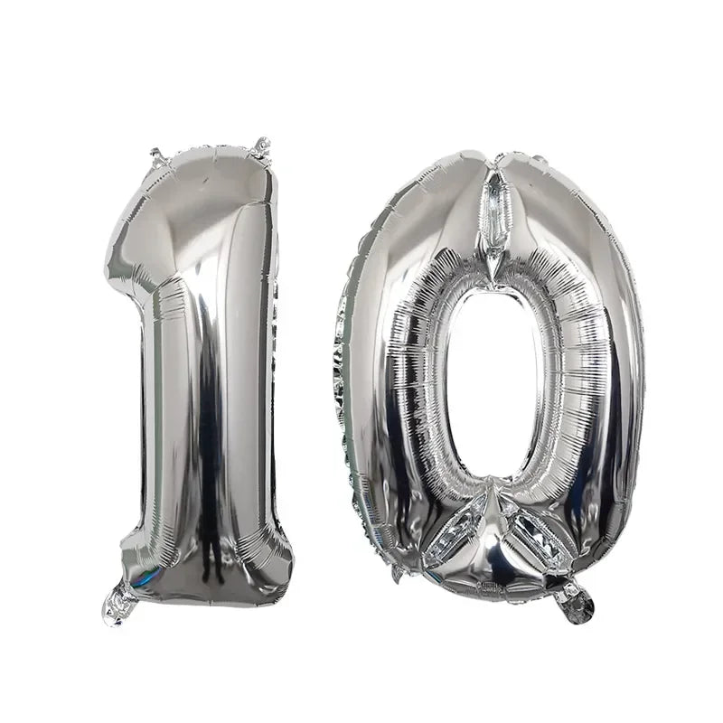 Silver foil number balloons shaped like the numbers 1 and 0 for a birthday party