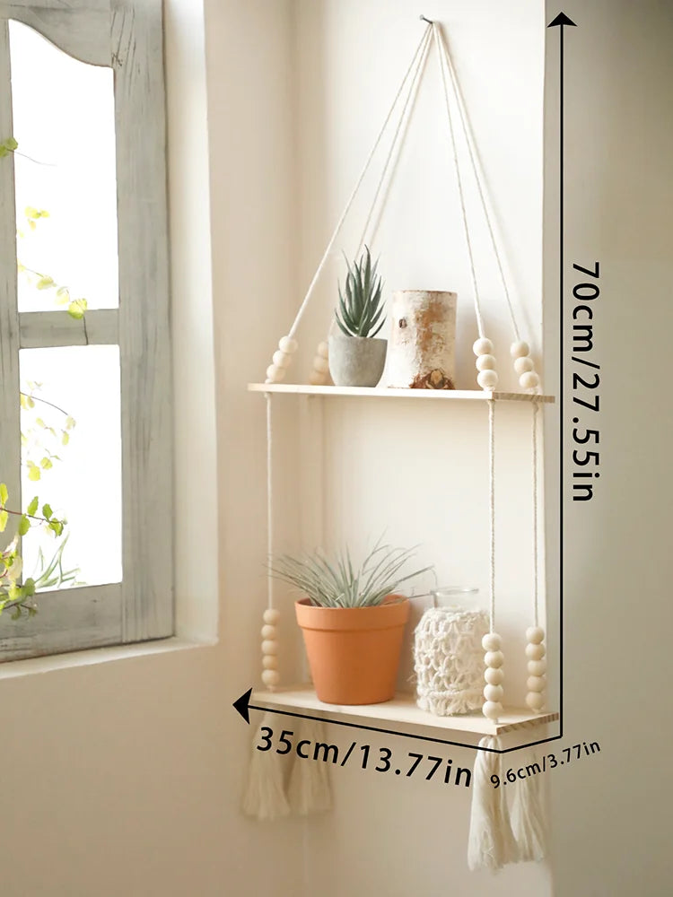 A rustic wooden wall shelf with macrame hangers displaying potted plants and decorative spheres.