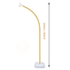 A gold-colored balloon arch kit with a stand, shown in a vertical view.