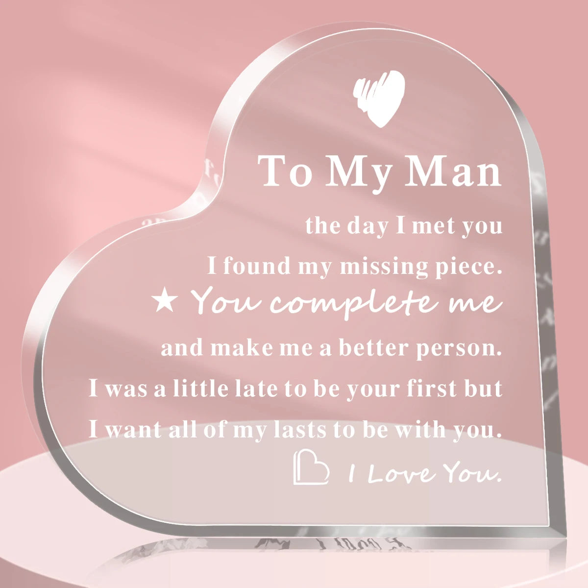 A clear acrylic heart keepsake plaque with engraved text saying To My Man I found my missing piece You complete me and make m