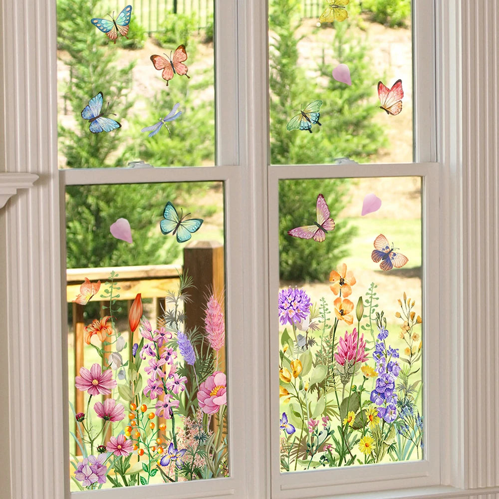 Window decals featuring colorful butterflies and wildflowers on a glass pane