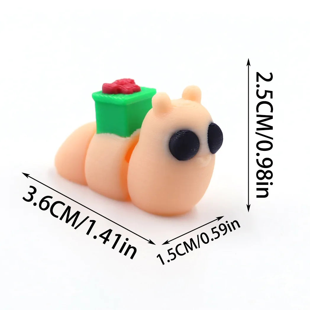 A small, light orange 3D printed cartoon animal figurine with a green ear and red nose.