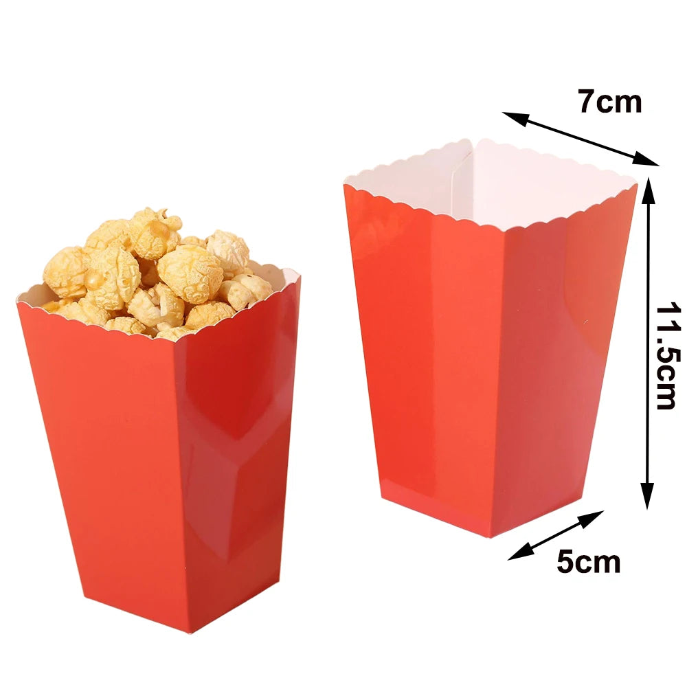 A red disposable paper cup filled with light yellow snacks, showing its dimensions.