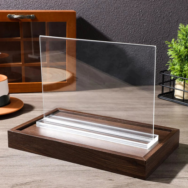 Clear acrylic double-sided tabletop sign holder with a wooden base and clear acrylic display panel