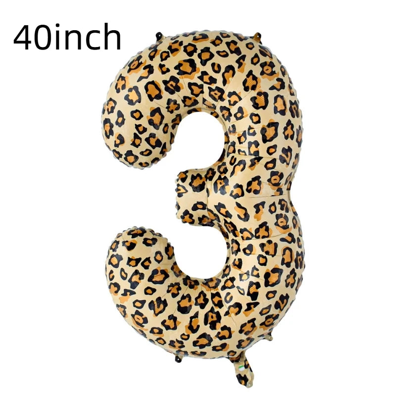 A large, inflatable number three shaped like a leopard print for birthday parties.