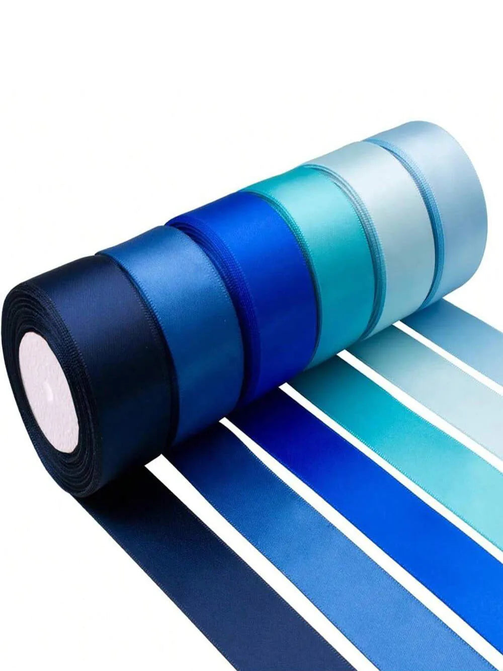 A roll of satin silk ribbon in various shades of blue and teal, shown next to a flat display.