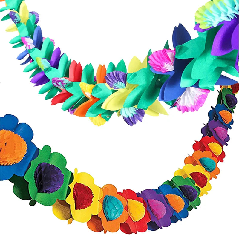 A colorful lei made of tropical flowers in shades of green, purple, pink, and orange.