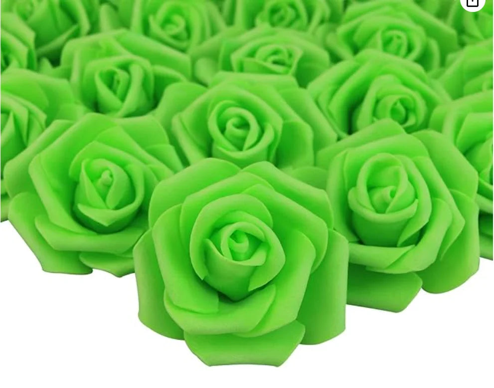 A close-up view of bright green artificial foam rose decorations arranged in a cluster.
