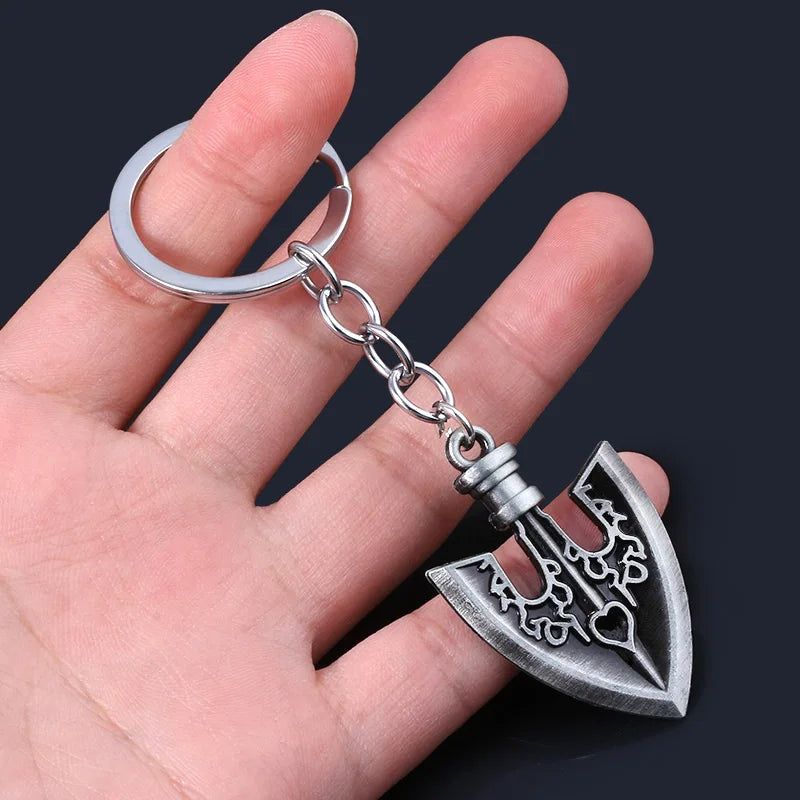 Silver metal keychain featuring an arrow design from JoJo's Bizarre Adventure