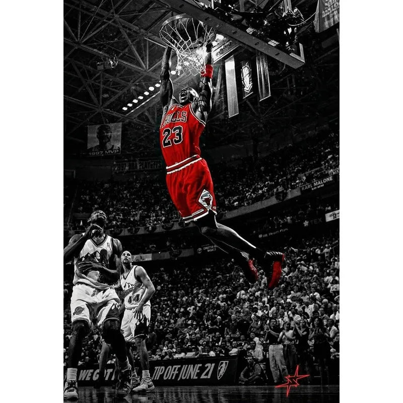 A dramatic black and white photo of a basketball player dunking during a game, captured in a stadium setting.