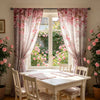 A set of two light pink sheer curtains with cherry blossom patterns hanging in a window.