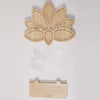 A wooden decorative lotus floating shelf in light natural wood color.