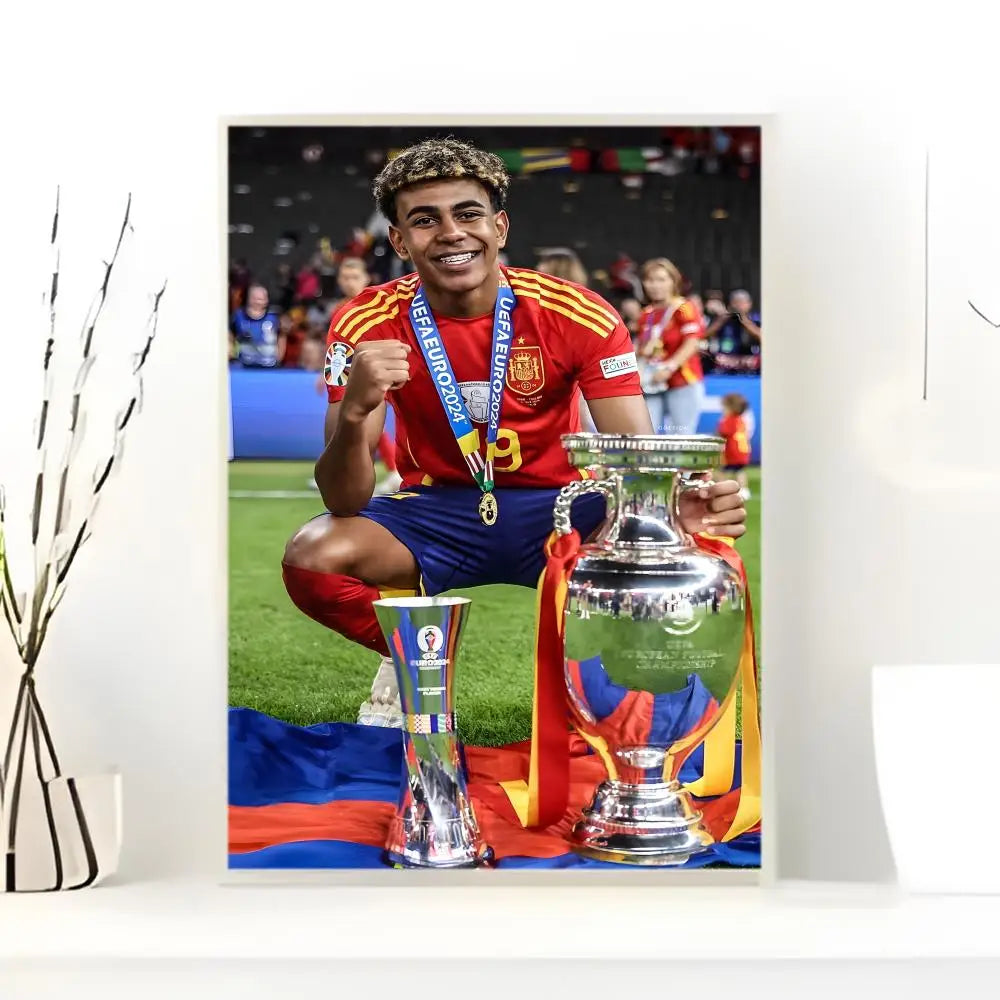 A portrait of Lamine Yamal celebrating with a trophy on a football field.