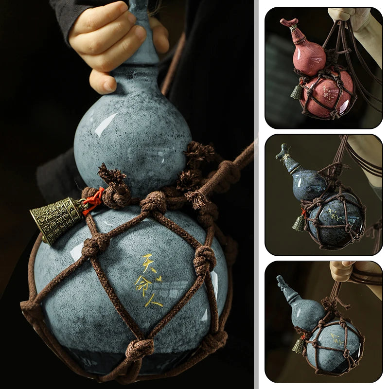 A traditional ceramic wine gourd with a dark gray body and a brown cord, featuring a small, reddish-brown object inside.