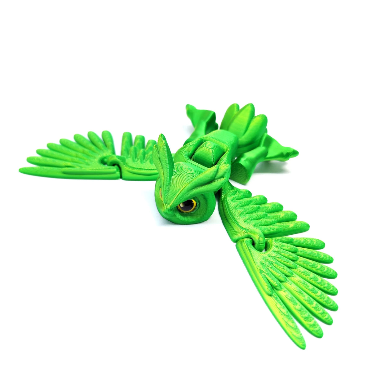 A bright green articulated 3D printed owl figurine with spread wings.