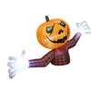 An inflatable Halloween pumpkin decoration with a carved face and purple plaid clothing.