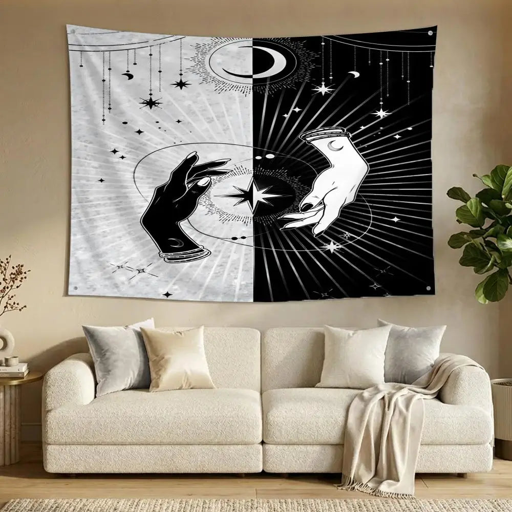 A decorative banner featuring a black and white celestial design of a hand and moon