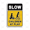 A black and yellow warning sign with the text SLOW CHILDREN AT PLAY