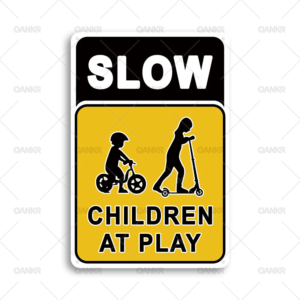 A black and yellow warning sign with the text SLOW CHILDREN AT PLAY