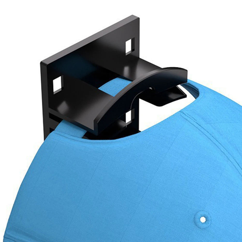 Black wall mounted hat organiser rack attached to a blue shirt.