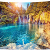 Panoramic waterfall rainforest tapestry featuring vibrant green foliage and cascading water in a lush forest setting.