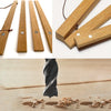 Natural teak wood magnetic poster frame with wooden strips and fasteners displayed on a wooden surface.