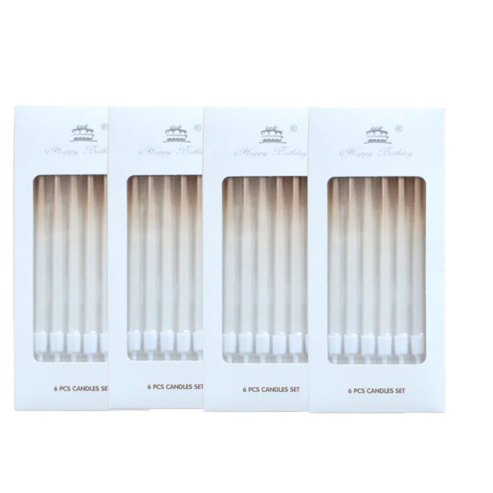 Three boxes of gradient blue metallic birthday candles, each containing six candles.