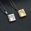 A pair of gold and silver openable book pendant necklaces featuring an engraved message in Spanish