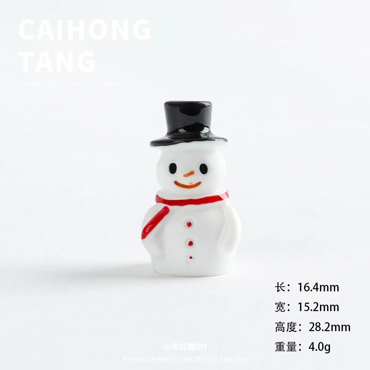 A small white resin snowman figurine with a black hat and a red scarf.