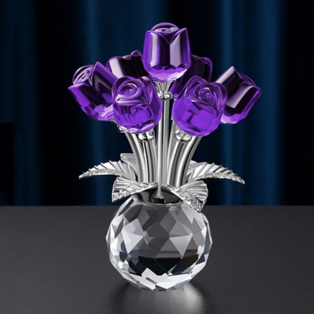 A crystal rose decorative flower arrangement featuring deep purple roses on a silver stem and clear glass base.