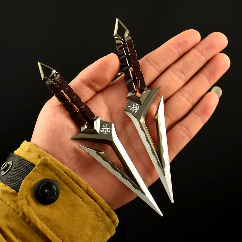 A hand holds a full-size replica katana prop with a dark brown hilt and silver blade against a black background.