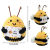 Handmade crochet bee doll with happy slogan on the body and a pocket for a hug gift