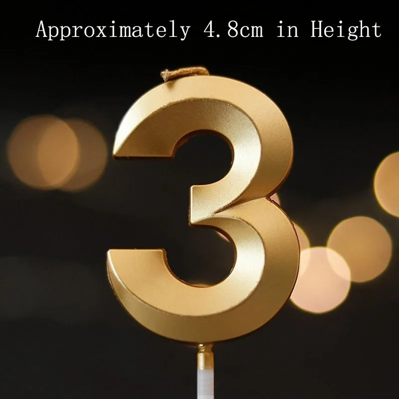 A golden number three candle on a stick, approximately 4.8cm in height.