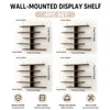 A set of four wall-mounted display shelves made of wood in a natural brown color.