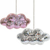 Two hanging glass mirror ornaments shaped like clouds, one pink and one silver.