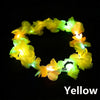 A crown of glowing yellow LED flowers used as a headband.