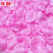 Pink silk rose petals used for weddings and events