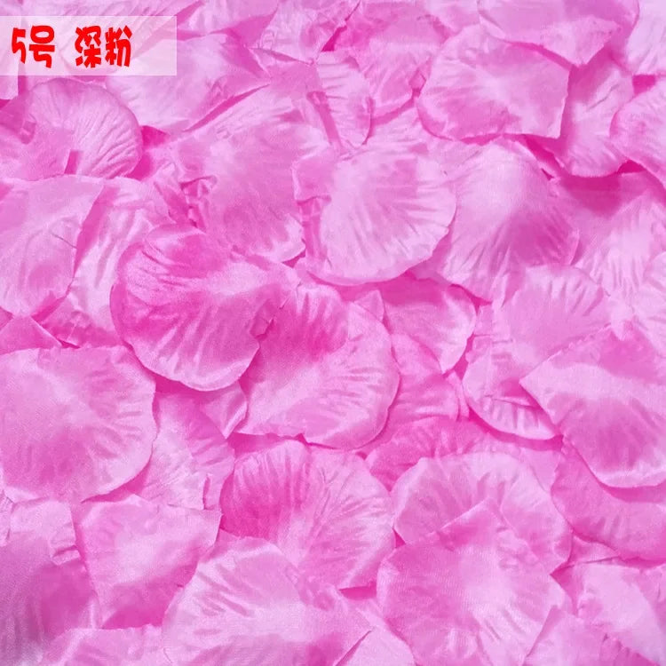 Pink silk rose petals used for weddings and events