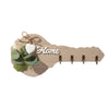 Rustic wooden key holder with a heart accent and four hooks made of light wood.
