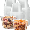 A stack of clear disposable plastic bowls with lids and a bowl filled with granola