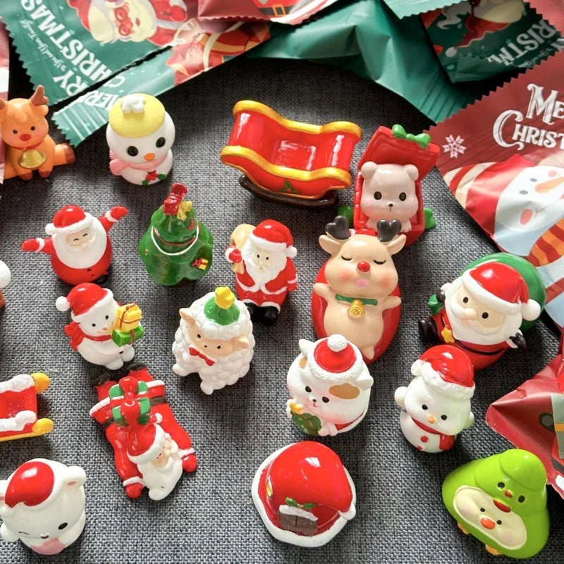 A collection of festive Santa Claus and snowman figurines for Christmas decor, including various colors and shapes.