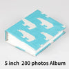 A light blue album with a white elephant pattern, featuring 200 photos.