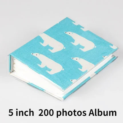A light blue album with a white elephant pattern, featuring 200 photos.