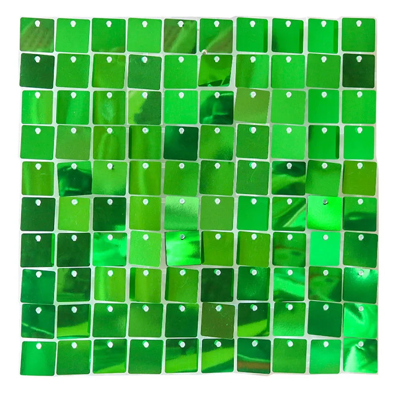 A grid of iridescent green sequins or tiles used as a shimmering wall backdrop.