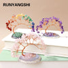 A set of natural crystal trees featuring amethyst and rose quartz on agate bases for home decor