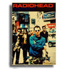 Poster for Radiohead featuring four band members in dark clothing and sunglasses against a city backdrop.