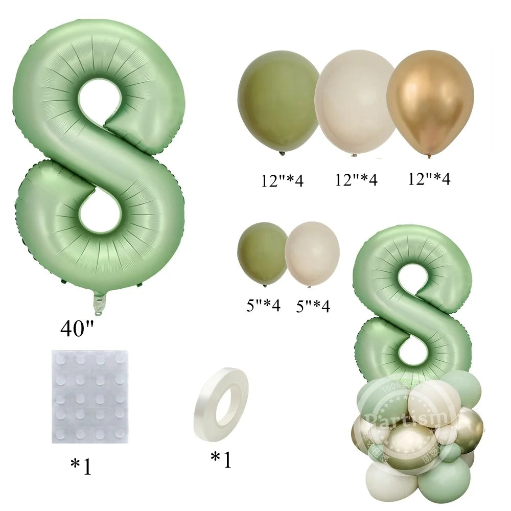 A set of vintage number balloons in sage green and champagne gold, including large foil numbers and smaller latex balloons.
